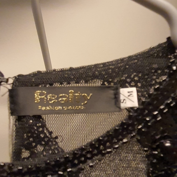 Beautiful shear long sleeve top with silver detailing. - Picture 3 of 6